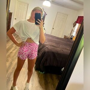 Pink Leopard Print Athletic Shorts.